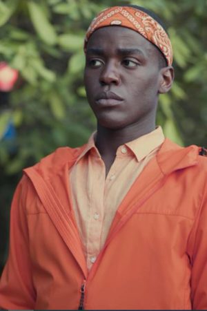Sex-Education-S04-Eric-Effiong-Orange-Jacket__96562